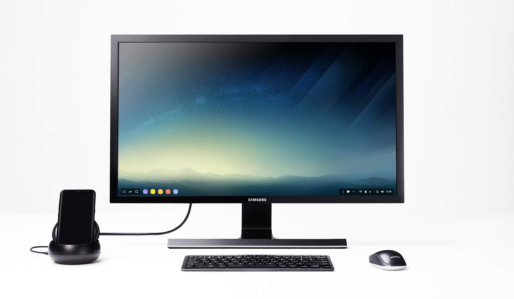 Samsung Galaxy S8 plugged into a DeX Station - with a connected screen, mouse and keyboard